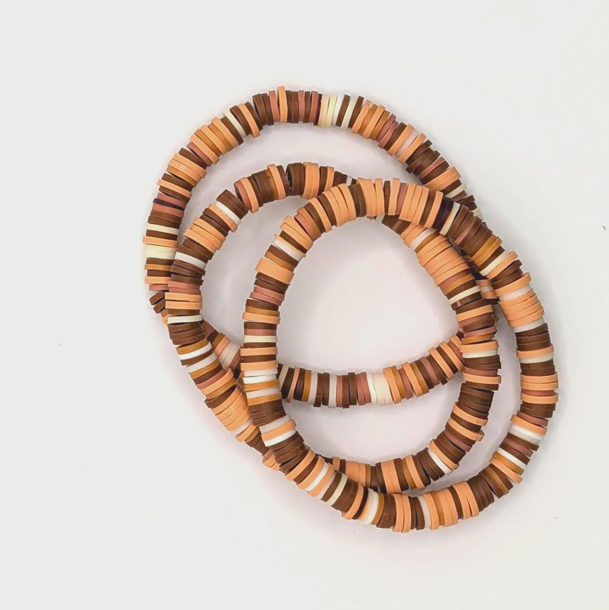 Butterscotch Caramel, brown and white clay bead bracelet